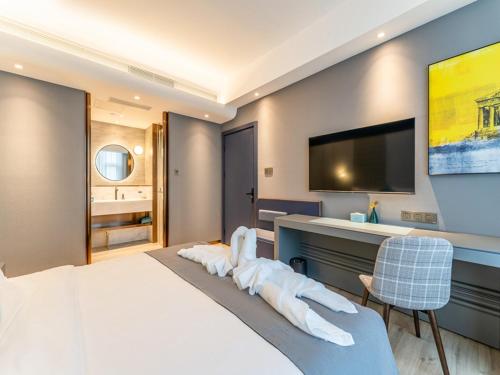 Imagen de la habitación del Hotel LanOu Hotel Qingdao Laixi Development Zone Beijing Road. Foto 6