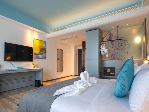 Imagen de la habitación del Hotel LanOu Hotel Qingdao Laixi Development Zone Beijing Road. Foto 8