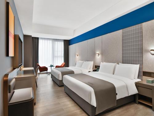 Imagen general del Hotel LanOu International Rizhao University Town. Foto 6