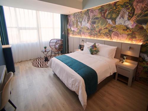 Imagen de la habitación del Hotel LanOu International Rizhao University Town. Foto 13