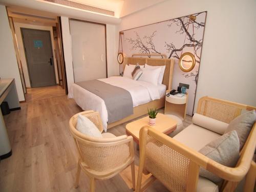 Imagen de la habitación del Hotel LanOu International Rizhao University Town. Foto 16