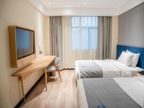 Imagen de la habitación del Hotel LanOu International Rizhao University Town. Foto 17