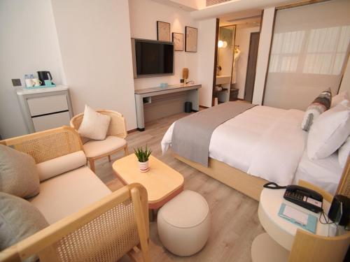 Imagen de la habitación del Hotel LanOu International Rizhao University Town. Foto 18
