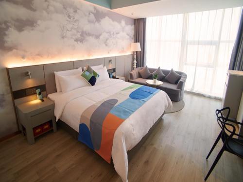 Imagen de la habitación del Hotel LanOu International Rizhao University Town. Foto 19