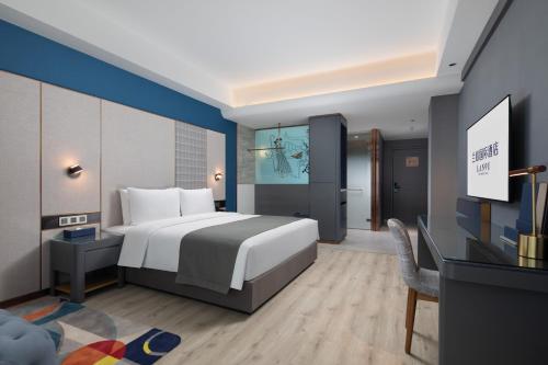 Imagen general del Hotel LanOu International Xishuangbanna Jinghong Gaozhuang. Foto 3