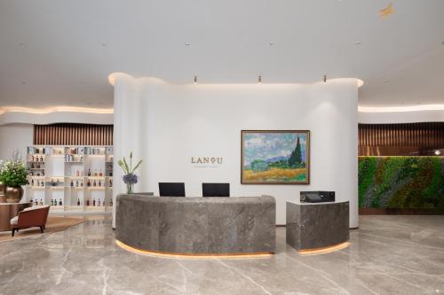 Imagen general del Hotel LanOu International Xishuangbanna Jinghong Gaozhuang. Foto 4