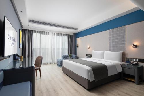 Imagen general del Hotel LanOu International Xishuangbanna Jinghong Gaozhuang. Foto 6