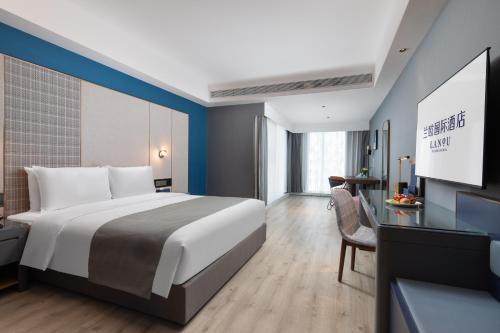 Imagen general del Hotel LanOu International Xishuangbanna Jinghong Gaozhuang. Foto 9