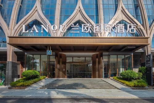 Imagen general del Hotel LanOu International Xishuangbanna Jinghong Gaozhuang. Foto 11