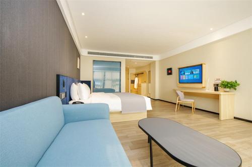 Imagen de la habitación del Hotel LanOu Jingzhou High-Speed Railway Station Fangte Oriental God Painting. Foto 16