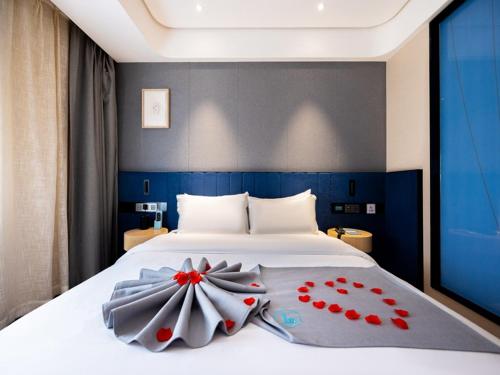 Imagen de la habitación del Hotel LanOu Lanzhou Zhengning Road Night Market. Foto 11