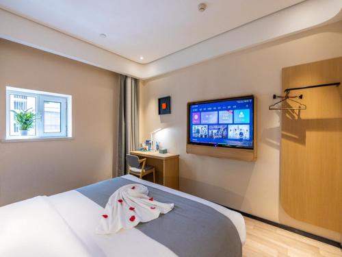 Imagen de la habitación del Hotel LanOu Lanzhou Zhengning Road Night Market. Foto 12