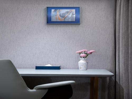 Imagen de la habitación del Hotel LanOu Lhasa Municipal Government Tibet University. Foto 17