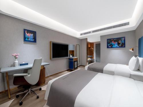 Imagen de la habitación del Hotel LanOu Lhasa Municipal Government Tibet University. Foto 18