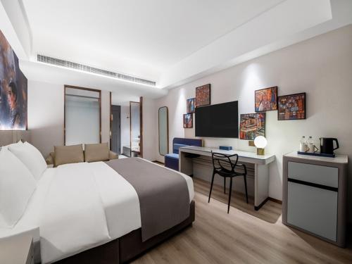 Imagen de la habitación del Hotel LanOu Lhasa Municipal Government Tibet University. Foto 19