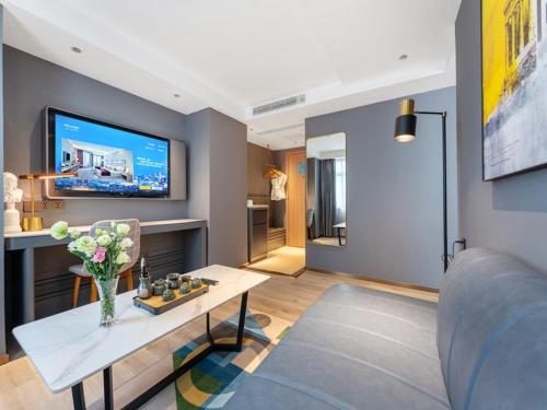 Imagen de la habitación del Hotel LanOu Shenzhen Luohu Ruipeng Building. Foto 11