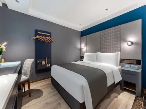 Imagen de la habitación del Hotel LanOu Shenzhen Luohu Ruipeng Building. Foto 12