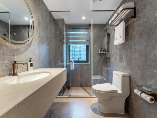 Imagen de la habitación del Hotel LanOu Shenzhen Luohu Ruipeng Building. Foto 14