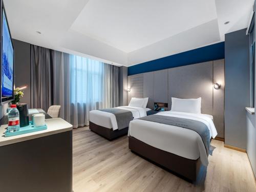 Imagen de la habitación del Hotel LanOu Shenzhen Luohu Ruipeng Building. Foto 16