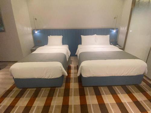 Imagen de la habitación del Hotel LanOu Suqian Central Shopping Mall. Foto 18