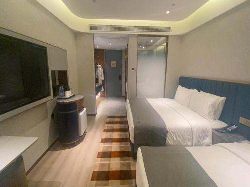 Imagen de la habitación del Hotel LanOu Suqian Central Shopping Mall. Foto 20