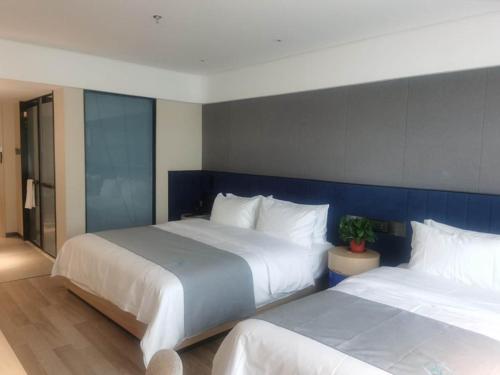 Imagen de la habitación del Hotel LanOu Tianshui Bus Terminal Station. Foto 20