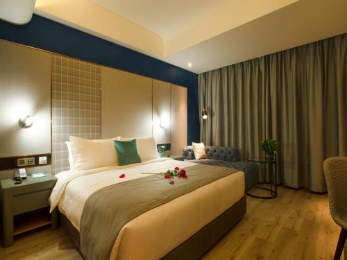 Imagen de la habitación del Hotel LanOu Weinan Fuping Millennium Longlano. Foto 15