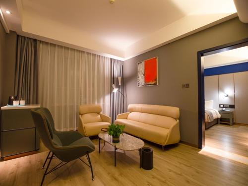 Imagen de la habitación del Hotel LanOu Weinan Fuping Millennium Longlano. Foto 16