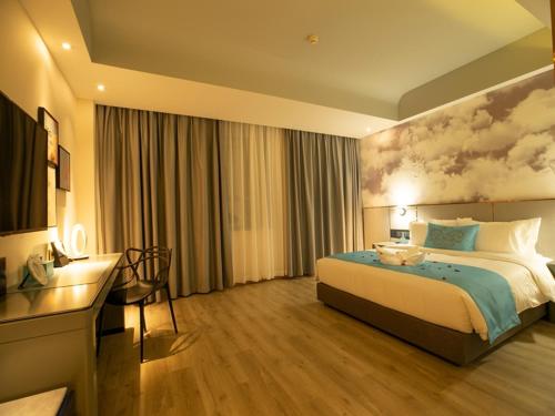 Imagen de la habitación del Hotel LanOu Weinan Fuping Millennium Longlano. Foto 18