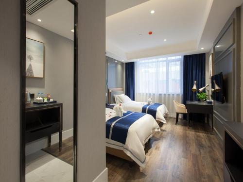 Imagen de la habitación del Hotel LanOu Xilinhot China Madu Cultural Plaza. Foto 10