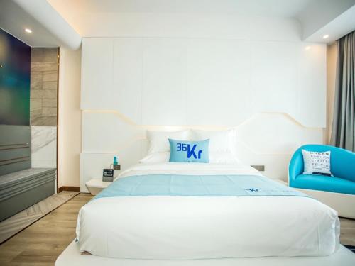 Imagen de la habitación del Hotel LanOu Zhengzhou Dengfeng Songshan Shaolin Cultural City. Foto 14