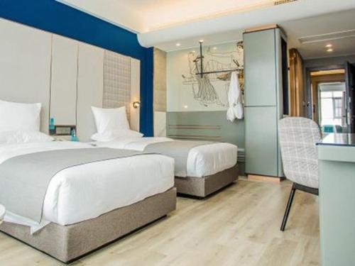 Imagen general del Hotel LanOu Zhengzhou Dengfeng Songshan Shaolin Cultural City. Foto 10