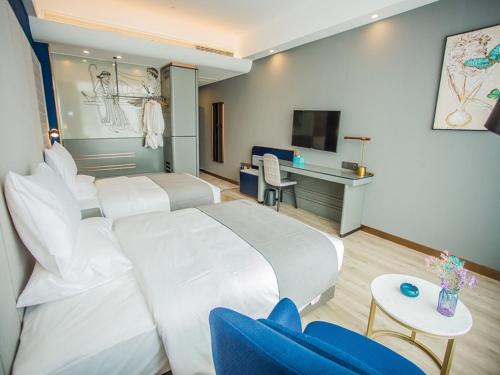 Imagen de la habitación del Hotel LanOu Zhengzhou Dengfeng Songshan Shaolin Cultural City. Foto 19