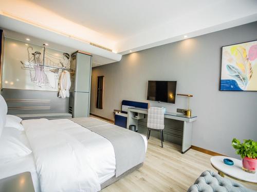 Imagen de la habitación del Hotel LanOu Zhengzhou Dengfeng Songshan Shaolin Cultural City. Foto 20