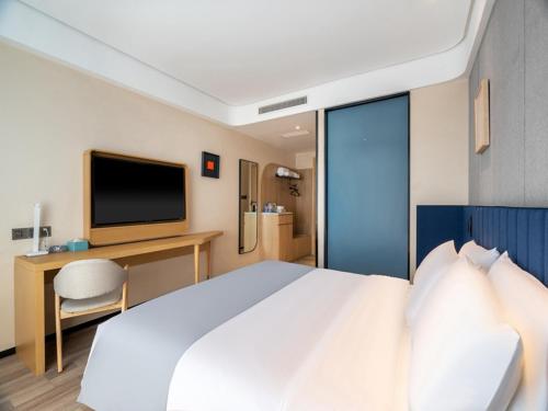 Imagen de la habitación del Hotel LanOu Zibo Yiyuan Zhenxing Road. Foto 19