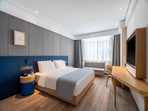 Imagen de la habitación del Hotel LanOu Zibo Yiyuan Zhenxing Road. Foto 20