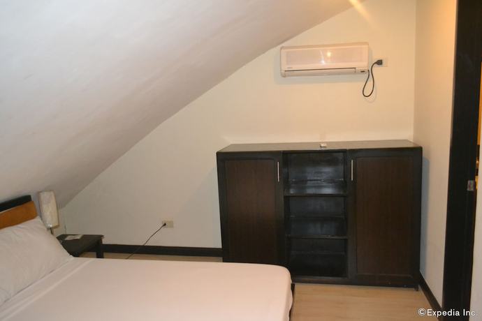 Imagen de la habitación del Hotel Lancaster Cebu. Foto 10
