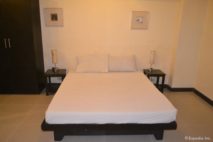 Imagen de la habitación del Hotel Lancaster Cebu. Foto 13