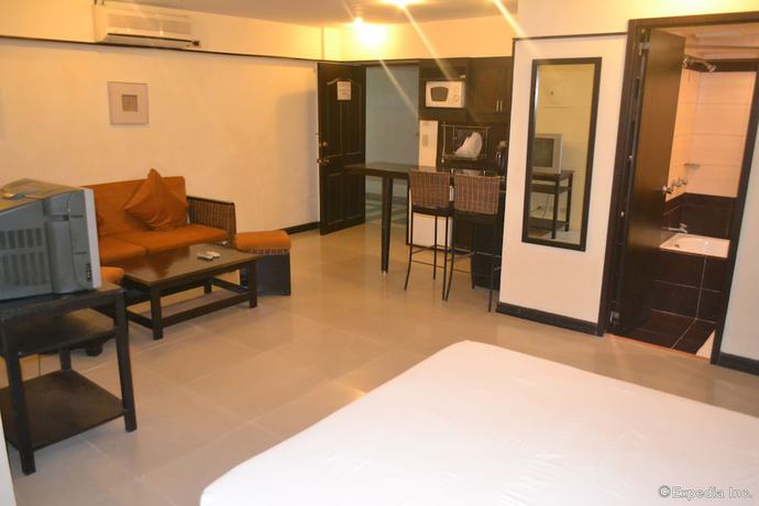 Imagen de la habitación del Hotel Lancaster Cebu. Foto 14