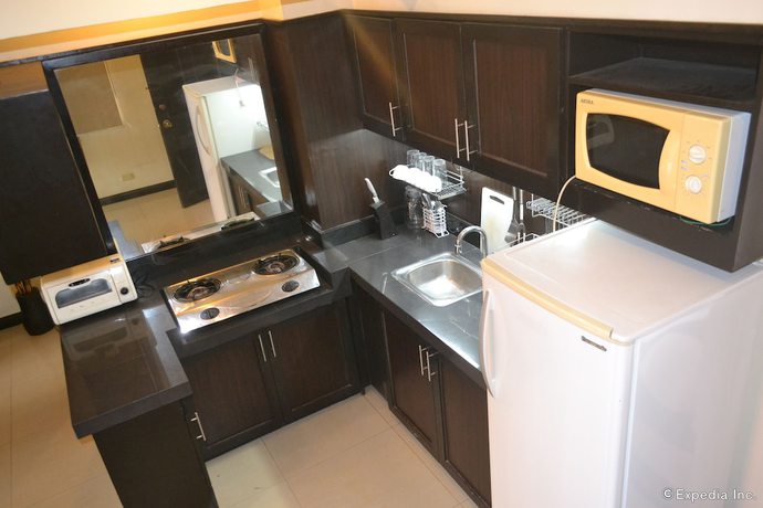 Imagen de la habitación del Hotel Lancaster Cebu. Foto 15