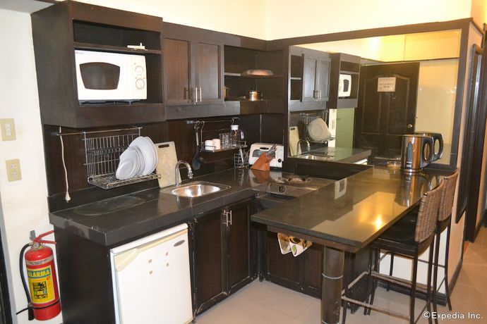 Imagen de la habitación del Hotel Lancaster Cebu. Foto 16