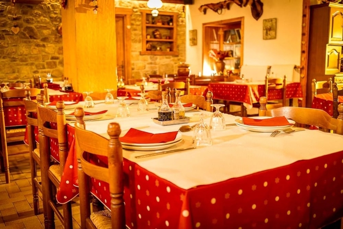 Imagen del bar/restaurante del Hotel L'ancienne Auberge. Foto 7