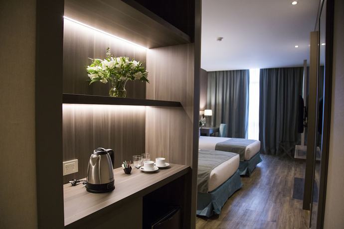 Imagen de la habitación del Hotel Land Plaza La Plata. Foto 16