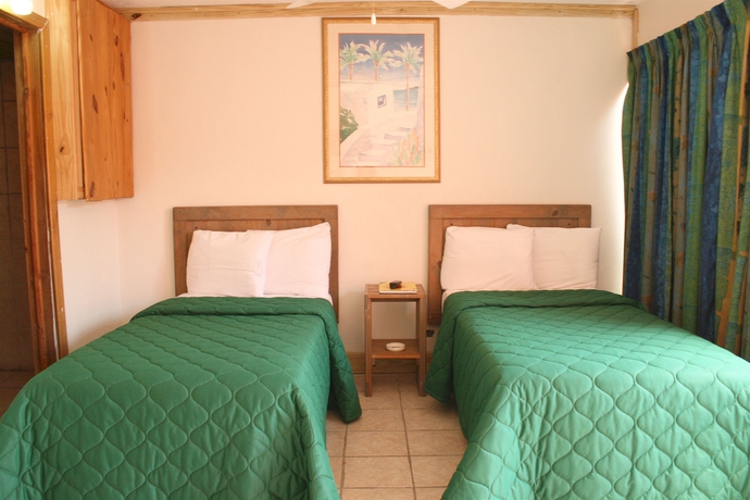 Imagen de la habitación del Hotel Land Shark Coco Plum Resort. Foto 2