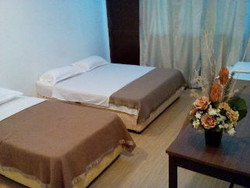 Imagen de la habitación del Hotel LandC Premium Stay. Foto 3