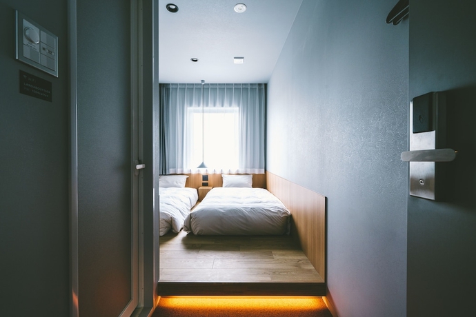 Imagen de la habitación del Hotel Landabout Tokyo. Foto 3