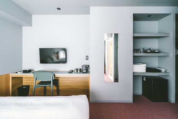 Imagen de la habitación del Hotel Landabout Tokyo. Foto 7