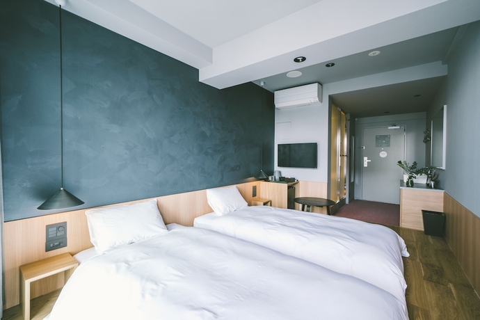 Imagen de la habitación del Hotel Landabout Tokyo. Foto 8