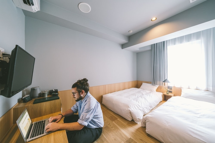 Imagen de la habitación del Hotel Landabout Tokyo. Foto 12