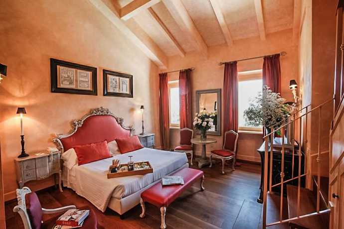 Imagen de la habitación del Hotel L'andana. Foto 2